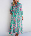 Smocked Printed Tie Neck Long Sleeve Dress